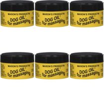 Masons Dog Oil Massaging Balm 100g tub on a wooden surface next to a dog
