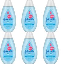 Johnson's Baby Bath 300ml bottle on a clean bathroom shelf beside a baby bath