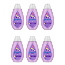 Johnson's Baby Bedtime Bath 300ml bottle on a bathroom shelf next to baby bath toys