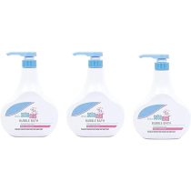 Sebamed Baby Bubble Bath Camomile 500ml bottle beside a baby bath with foam bubbles