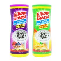 Elbow Grease Foaming Drain Cleaner 500g tub on a bathroom shelf beside the sink
