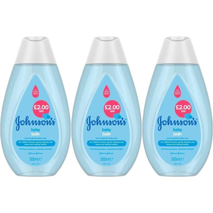 Johnson's Baby Bath 300ml bottle on a clean bathroom shelf beside a baby bath
