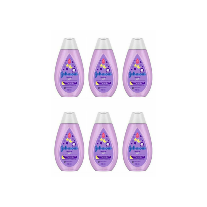Johnson's Baby Bedtime Bath 300ml bottle on a bathroom shelf next to baby bath toys
