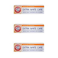 Arm & Hammer Extra White Care Toothpaste 125g tube on a clean bathroom shelf
