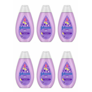 Johnson's Baby Bedtime Bath 300ml bottle on a bathroom shelf next to baby bath toys
